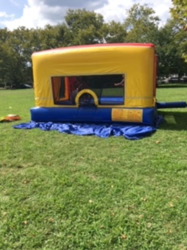 A bounce house set up for a community day