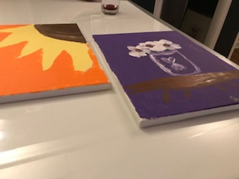 Sunflower and mason jar paintings from a paint night